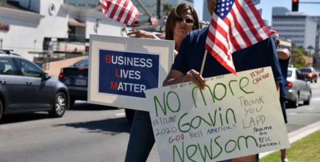 Beverly Hills, CA USA - Aug 1, 2020: Protesters holding signs to recall California Governor Gavin Newsom