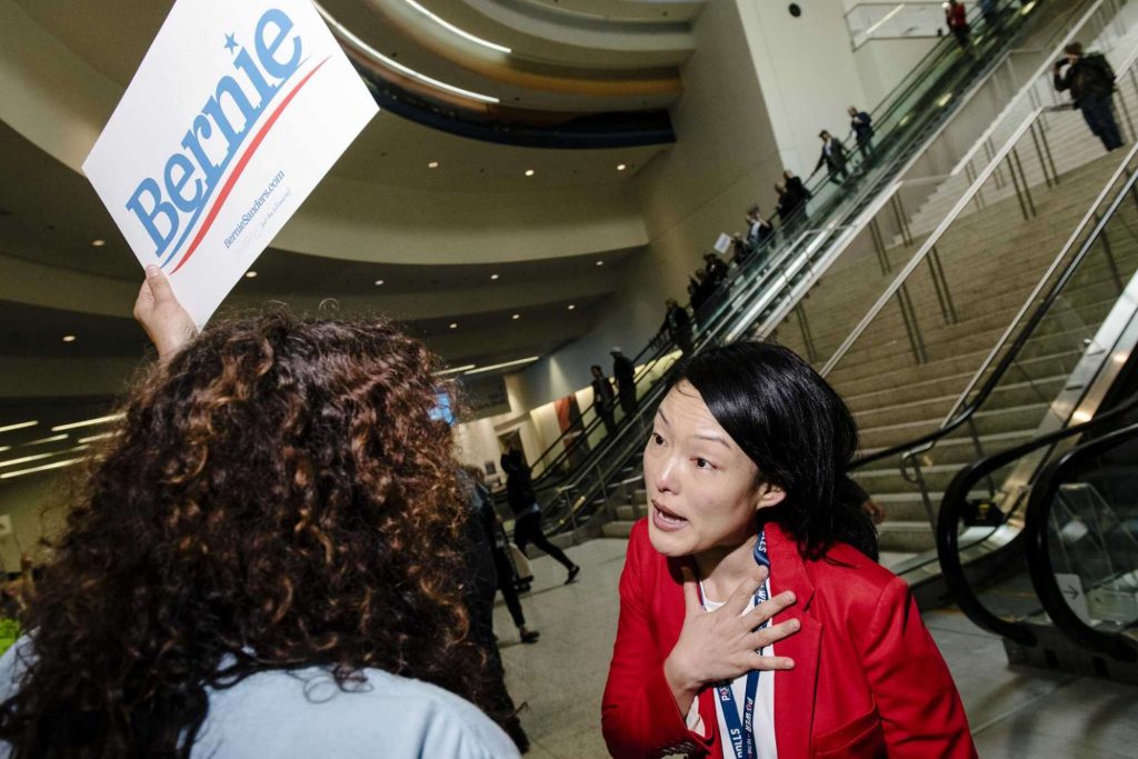 Jane Kim speaks with Bernie Sanders supporters during the June 2, 2019, California Democratic Party convention in San Francisco